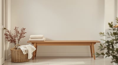 An empty bench in a utility room with a folded towel